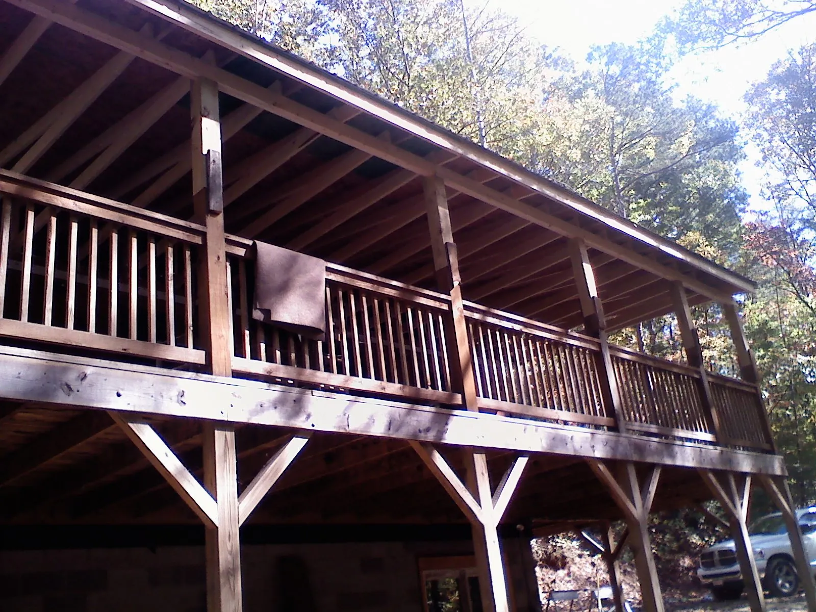 Timber framing under a new elevated porch and deck — Roof Leak Repair in Cody by Roofing Brothers